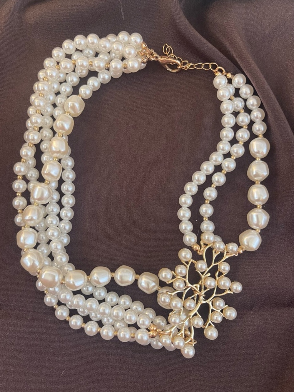 Elegant Pearl Multi-Strand Necklace with Gold Floral Accent
